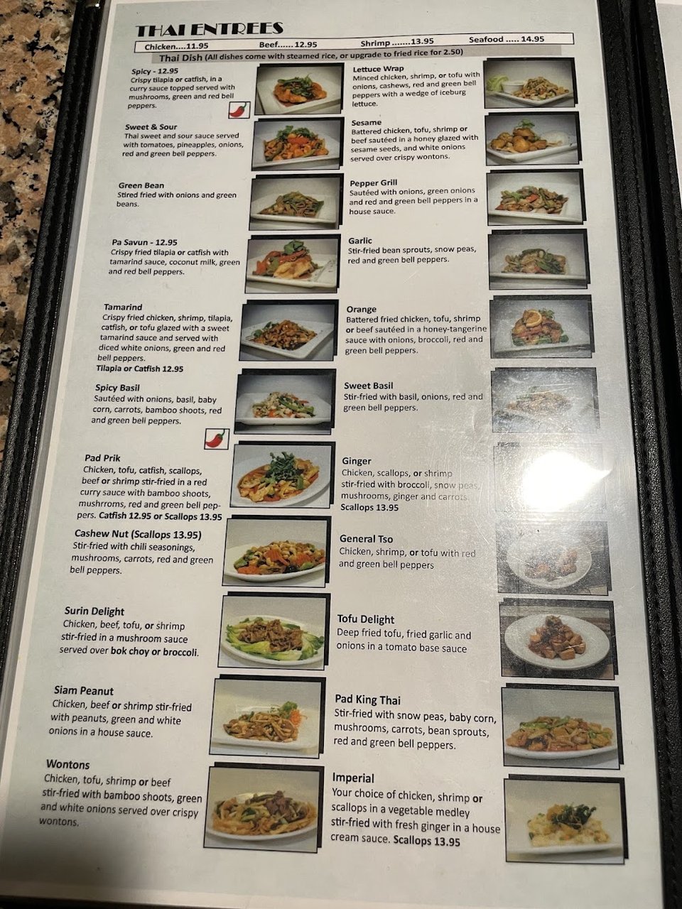 Thai menu page with sushi and pho.