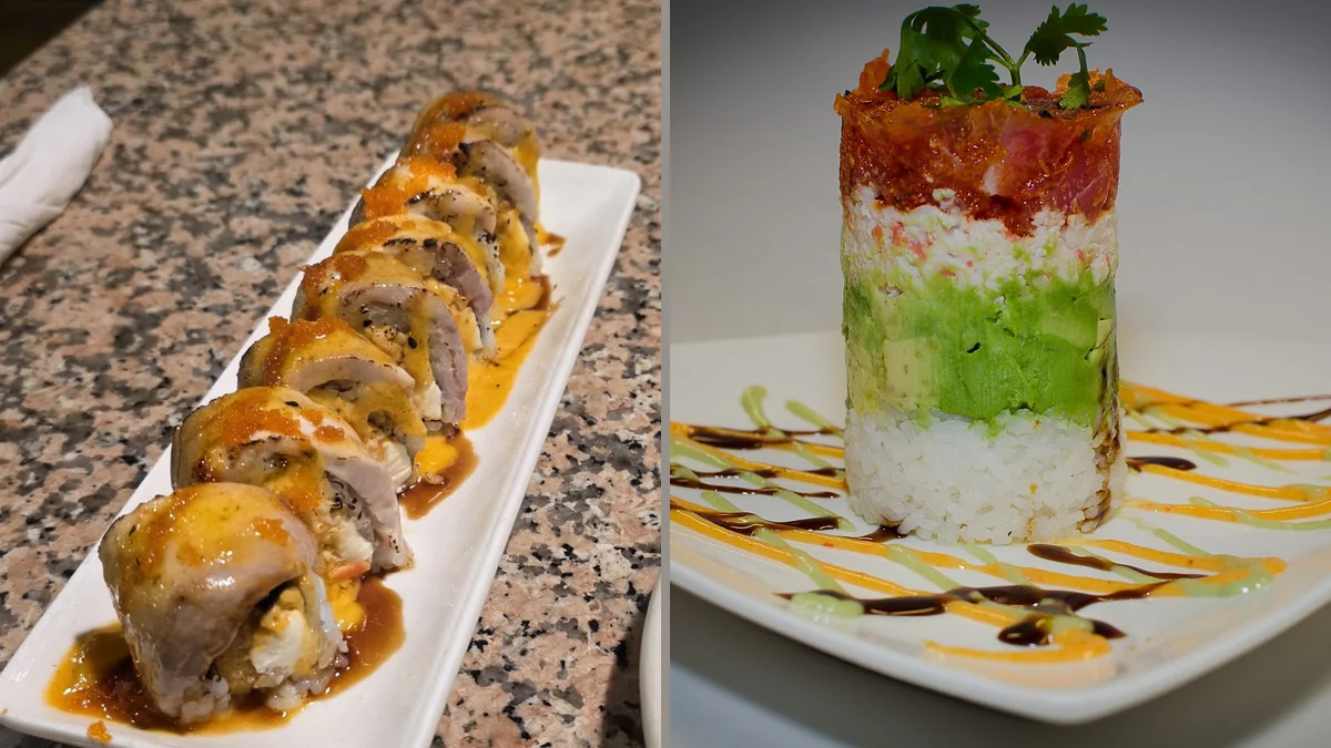 Colorful plates of sushi and spring rolls.